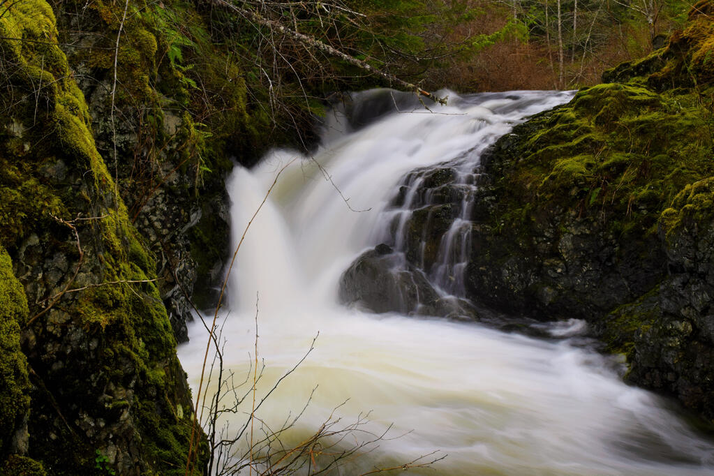 A rushing waterfall.